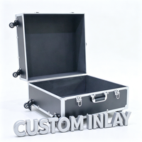 Valise trolley en aluminium noir avec roulettes pivotantes et freins, poignée télescopique et intérieur doublé vide, valise de transport à roulettes