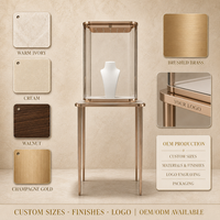 Vitrine à bijoux sur mesure en or rose avec vitrine en verre pour boutique de bijoux de marque, distributeur et design d'intérieur