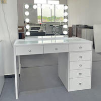 Miroir lumineux moderne en acier inoxydable Table de toilette murale avec tiroirs de coffre intégrés Design d'ampoule de studio pour le maquillage