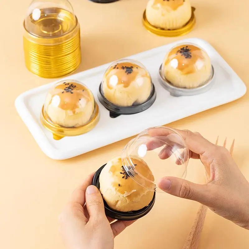 Postre dorado Panadería Tapa transparente Fabricantes redondos de plástico Caja personalizada Cupcake Muffin Mini Cake Caja de embalaje de alimentos con tapas