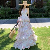 Robe longue d'été tendance à imprimé floral, dos nu, à lacets, à volants étagés, pour femme, idéale pour les soirées à la plage