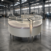 Vitrine à bijoux moderne de luxe rose personnalisée avec éclairage LED et comptoir en verre pour centre commercial