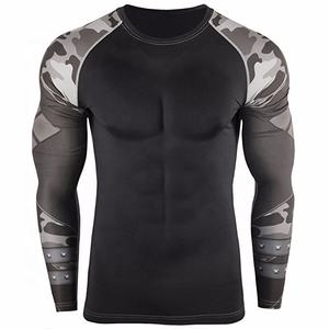 Rashguard de fitness sublimado personalizado venta directa de fábrica para hombres MMA recortada Rash Guard ropa deportiva personalizada - Product Image 1
