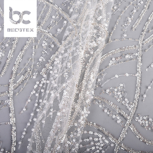 <span class=keywords><strong>Pas</strong></span> <span class=keywords><strong>cher</strong></span> prix <span class=keywords><strong>de</strong></span> gros conception personnalisée blanc sequin perlé broderie 100% polyester tricoté dentelle tissu pour <span class=keywords><strong>robe</strong></span> - Product Image 2