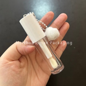 ISMAN ขายส่ง <span class=keywords><strong>ลิป</strong></span>กลอสแบบหลอดกลมใสขนาด 6 มล. พร้อมพวงกุญแจตุ๊กตาปอมปอม หัวแปรงใหญ่ บรรจุภัณฑ์<span class=keywords><strong>ลิป</strong></span>กลอสแบบกำหนดเองได้ พร้อมโลโก้ <span class=keywords><strong>ลิป</strong></span>ออยล์ - Product Image 5