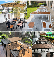 Ensemble de salle à manger d'extérieur 5 pièces : Table ronde Sunburst 105 cm en bois grainé avec 4 chaises en fer noir à pieds courbes – Vente en gros, faible MOQ