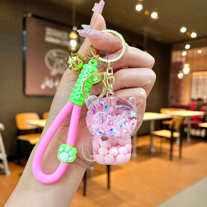 Porte-clés créatif ours en PVC rempli d'huile tasse à thé laiteuse perles lumineuses bouteille de sable mouvant mignon sac à main pendentif Anime accrocher - Product Image 4