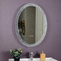 Miroir de salle de bain moderne ovale à LED avec bord texturé, résistant à l'eau, personnalisable, décoratif, à commande tactile