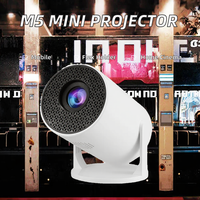 Mini projecteur LED portable M5 avec support pour téléphone portable, 480P, 50 lumens ANSI - Cinéma maison et cadeau original pour enfants