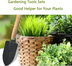 Mini ensemble d'outils de jardinage en trois pièces avec manche en bois, spatule, pelle, râteau pour le jardinage à domicile et les pots de fleurs - Product Image 2