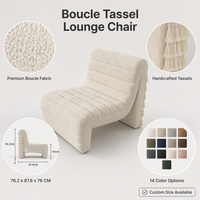Fauteuil lounge sophistiqué en bouclette blanche avec dossier à franges en cascade, mobilier design sculptural pour suite de luxe