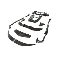 Kit de carrosserie en fibre de carbone sèche style OEM : lames avant et arrière, jupes latérales, couvre-aileron arrière, etc. pour Lamborghini Revuelto