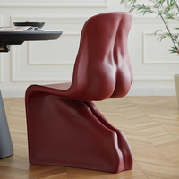 Chaise d'appoint sculpturale monobloc en plastique renforcé de fibres, design moderne, certifiée CE pour une utilisation intérieure et extérieure