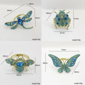 Ensemble de 4 anneaux de serviette de luxe en plaqué or avec cristaux bleus sur le thème du printemps pour la décoration de table - Product Image 6