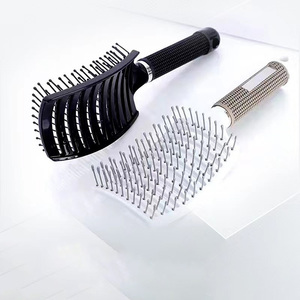 Spazzola Pettine Curva Bianca e Nera per Styling Districante in Plastica per Uso Multifunzionale - Product Image 2