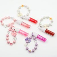 Huile repulpante pour les lèvres végétalienne en gros, personnalisable, transparente, parfumée aux fruits, hydratante et changeante de couleur