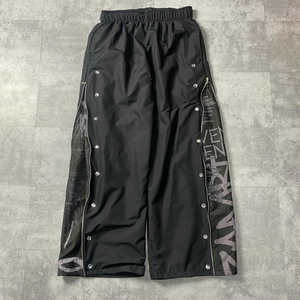 <span class=keywords><strong>Pantalon</strong></span> d'entraînement en polyester et spandex pour homme avec fermeture éclair <span class=keywords><strong>sur</strong></span> <span class=keywords><strong>le</strong></span> côté - Product Image 1