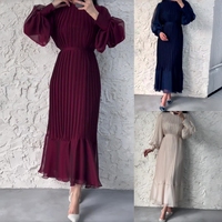 Robe longue plissée élégante à col rond et manches lanternes pour femme, style décontracté et mature, idéale pour les boutiques de mode.