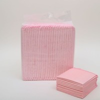 Tapis absorbants pour animaux de compagnie en tissu non tissé et charbon de bambou à forte absorption d'eau pour l'apprentissage de la propreté des chiots
