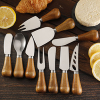 Ensemble de couteaux à crème jetables en bois d'acacia de style occidental pour servir le pain et le fromage en stock transfrontalier