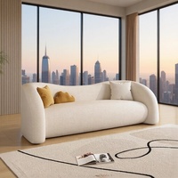 Canapé trois places élégant et courbé, style crème, avec structure en bois massif, revêtement anti-griffures pour chat, éponge moderne, dossier camelback, personnalisable pour salon
