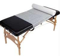 Rouleau de papier pour table de massage Rouleau de lit non-tissé Drap de lit en tissu tissé Drap-housse jetable