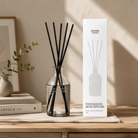 Diffuseur de parfum personnalisé en verre transparent rond avec bâtonnets en rotin noir, sans flamme, pour projets hôteliers