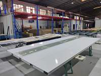 Fabrication professionnelle de portes de garage en verre transparent modernes en aluminium sans cadre avec matériau en alliage d'aluminium