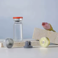 Flacons en verre ronds vides avec bouchon en caoutchouc assorti pour le remplissage de produits cosmétiques