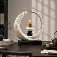 Sculpture circulaire moderne en résine blanche mouchetée avec motif de pierres colorées pour la décoration de table de salon, vente en gros