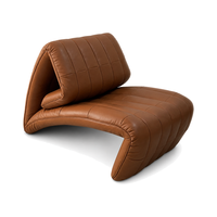 Fauteuil lounge en cuir cognac, capitonné, courbé, moderne, rembourré, pour hall d'hôtel, club, intérieur