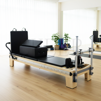 Reformer Pilates en érable avec barre de pieds coulissante pour équipement de fitness à domicile, système d'entraînement de la force du tronc