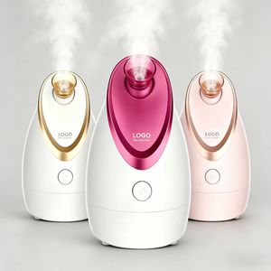 เครื่องอบไอน้ำร้อนสำหรับผิวหน้าขนาดมินิแบบใหม่ ทำความสะอาดล้ำลึก ใช้งานง่ายเพียงปุ่มเดียว วางบนโต๊ะได้ - Product Image 1