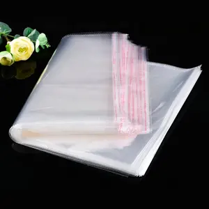 Bolsas de embalaje de plástico Opp adhesivas autosellantes transparentes personalizadas para embalaje de ropa de dulces