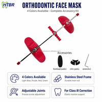 Appareil de traction extra-oral 4 couleurs, cadre en acier inoxydable, coussinets en mousse, clé avec articulation réglable, masque orthodontique