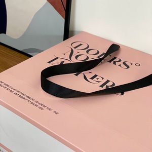 High Quality <b>Biodegradable</b> Eco-Friendly Thick Cardboard Portable Shopping <b>Paper</b> Bag Custom Logo Ribbon Handle Luxury Gift Pack - Product Image 3