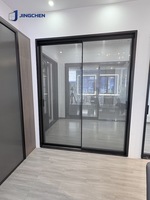 Porte coulissante invisible sans rail en alliage d'aluminium moderne, silencieuse, à fermeture douce, double vitrage en verre trempé pour intérieur d'appartement