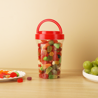 Vente en gros d'usine - Pot alimentaire en plastique PET transparent de 450 ml, calibre 83, avec couvercle à poignée pour le stockage de noix, de bonbons et de fruits secs