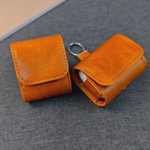 เคสหนังลายวัวแบบเรโทรสำหรับ AirPods พร้อมห่วงคล้องหนัง PU และคาราไบเนอร์ป้องกันการสูญหาย - Product Image 2