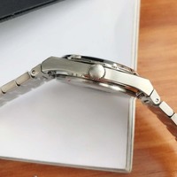 Montre-bracelet vintage pour homme, mouvement à quartz, fonction date verte, bracelet en acier intégré, boîtier octogonal 40 mm, 22 mm, simple