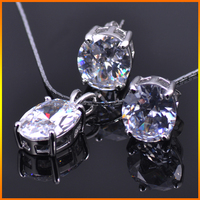 Ensemble de bijoux Jasen en argent sterling 925 avec pendentif ovale en rubis, collier, bague et boucles d'oreilles – Cadeau classique pour les fêtes et le quotidien