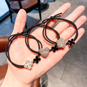 Scrunchies coréens scintillants en strass, nœuds de cheveux en forme de trèfle à quatre feuilles, élastiques en caoutchouc, accessoires pour cheveux pour femmes, vente en gros - Product Image 2