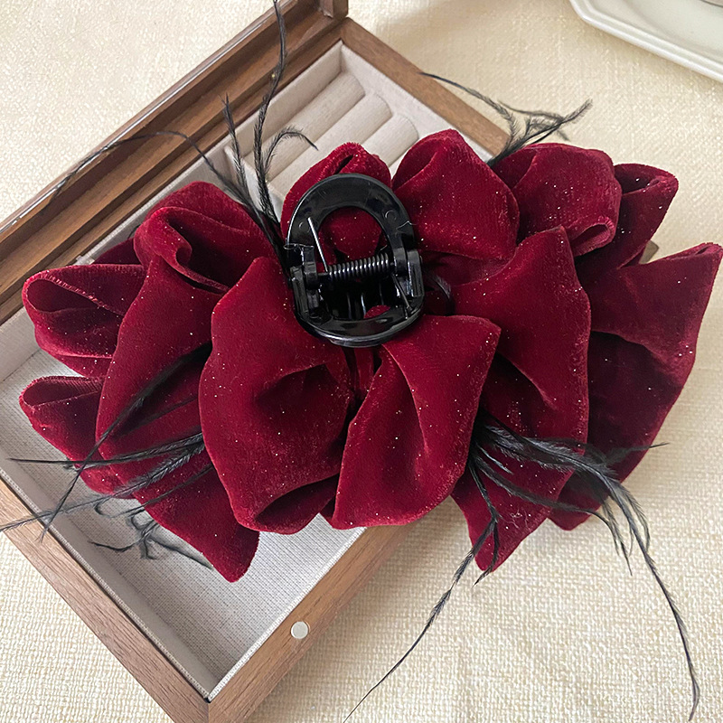 Piume di velluto rosso nuvola
