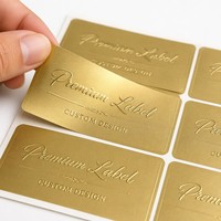 Étiquette autocollante métallique dorée personnalisée en relief pour l'image de marque des produits haut de gamme, pour l'emballage cadeau, vente en gros