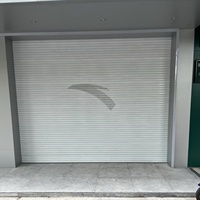 Porte de garage automatique en alliage d'aluminium personnalisée de haute qualité, porte de passage de bâtiment sécurisée et isolée