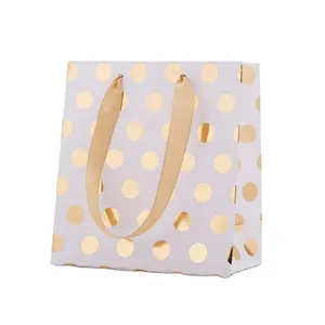 Gift paper bags customized gold gilded dots high-grade cosmetic clothing hair paper handbags in ctock customized printing LOGO