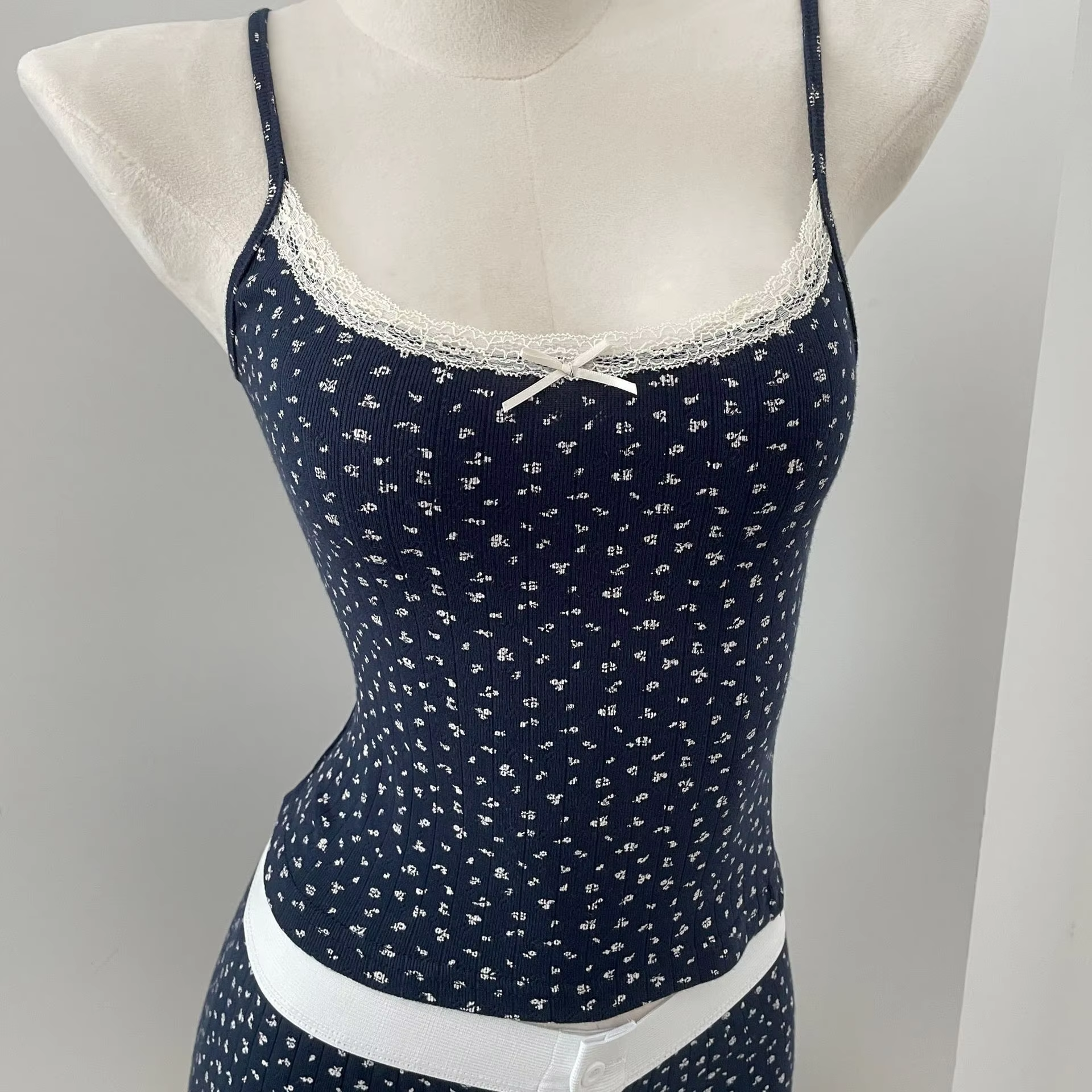 Navy blue bottom with white flower --vest