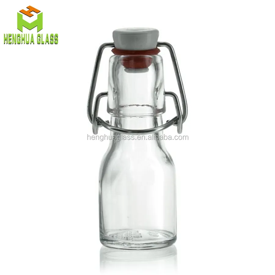 小型ミニ50ml2oz丸型透明ドリンクスイングトップオリーブオイル液体ガラス瓶卸売
