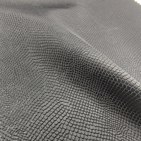 Nouveau produit : Tissu en cuir PU à grain fin pour vêtements et pantalons en cuir