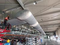 Conduit d'air rond perforé en tissu blanc pour l'alimentation en air des salles blanches industrielles